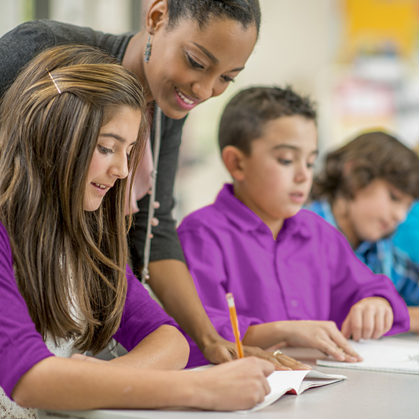 Teacher Helping Students